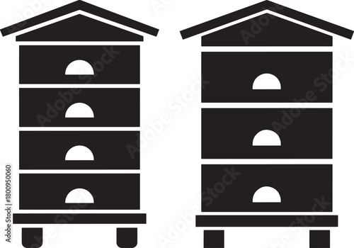 Two tall beehive silhouettes with arched entrances