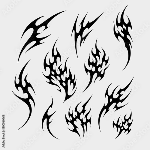  Set Swirl Tribal Flame Tattoo Symbol with Y2K Edgy Aesthetic, Abstract Burning Fire Silhouette, High Contrast Sharp Line Ornament for Fashion Graphic, Sticker Print and Digital Art Asset