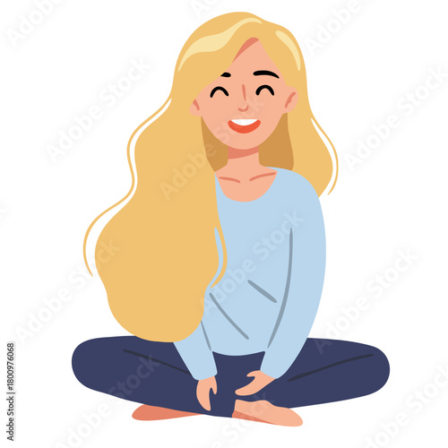 Happy woman with long blond hair sitting cross legged. Relaxed young female smiling, concept of positive emotion and well being.