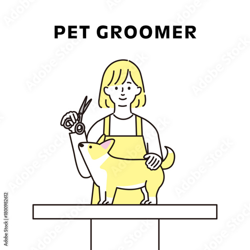 犬の毛をトリミングする女性