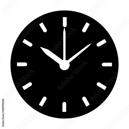 Clock face displaying the time of 10 AM in black and white
