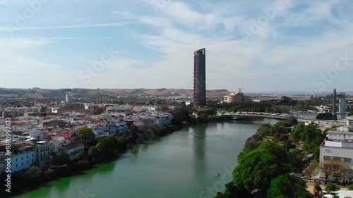 Seville cityscape with guadalquivir river and tower. Media