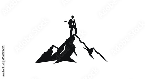 Silhouette of a determined businessman standing triumphantly atop a rugged mountain peak