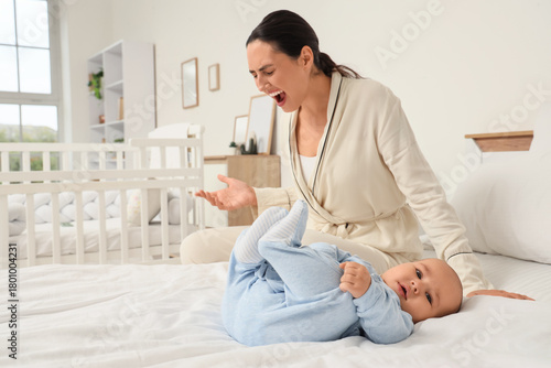 Stressed young mother screa...