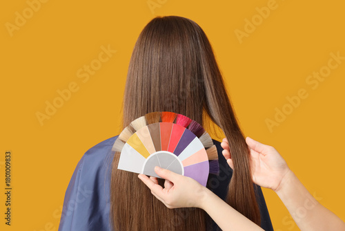 Female hands with hair colo...
