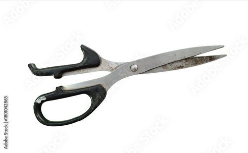 Old metal scissors with worn and broken black handles displayed on a white background