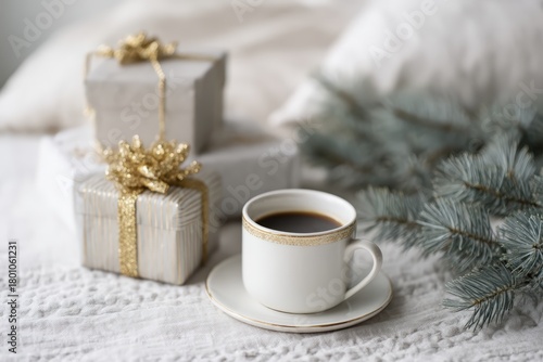Wallpaper Mural Hot coffee in a festive cup on a cozy bed with decorated Christmas gifts and fir branches, creating a warm holiday scene Torontodigital.ca