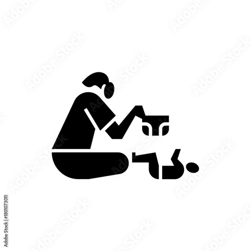 mom changing diaper glyph icon. changing diaper illustration.