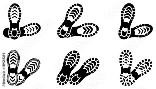 Collection of Six Black Boot Sole Imprints on White Background