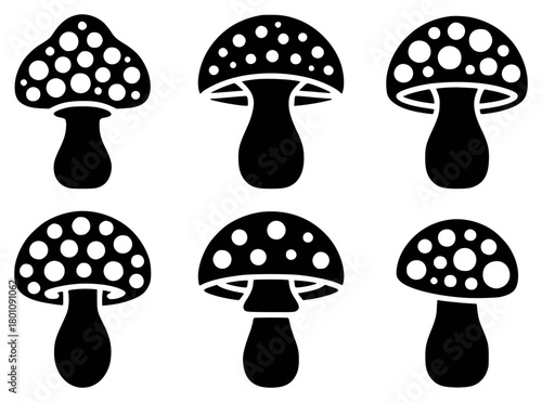 Six Black and White Silhouette Mushroom Icons with White Dots