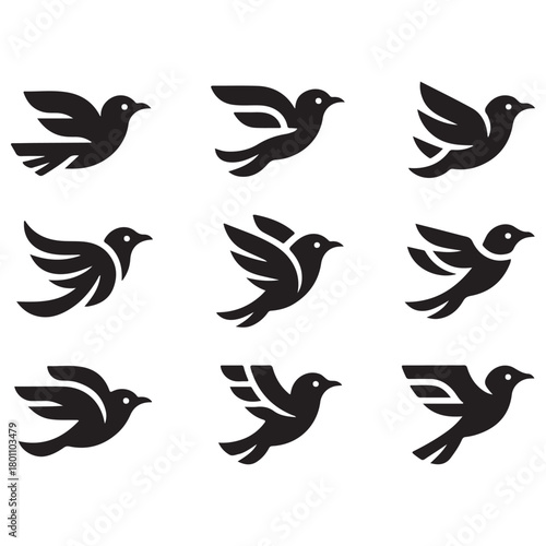 Minimalist Abstract Black Flying Bird Silhouettes on White Background