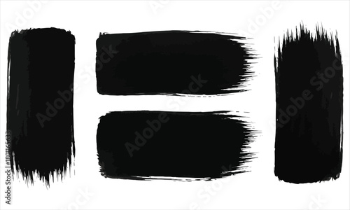 Collection of black brush strokes in various shapes and textures on a white background
