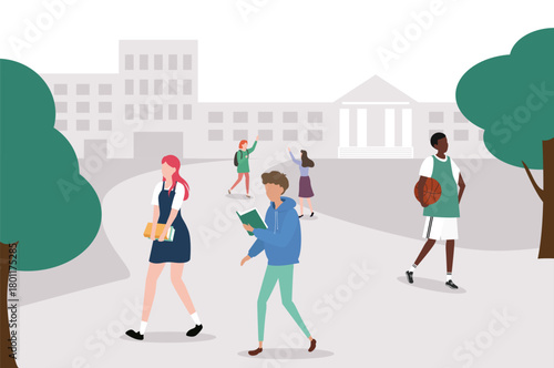 Students on a school campus, some walking, some interacting, and one carrying a basketball. It shows a typical school day scene, university life.