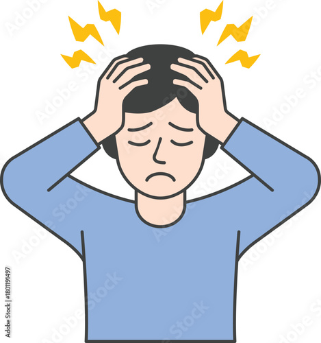 두 손으로 머리를 감싸 쥐고 있는 남자