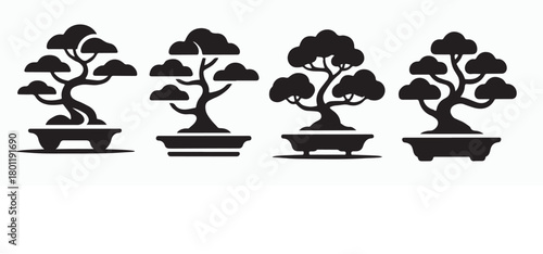 four simple black silhouette bonsai trees in pots