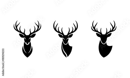 Set of deer head silhouette icons on a white background