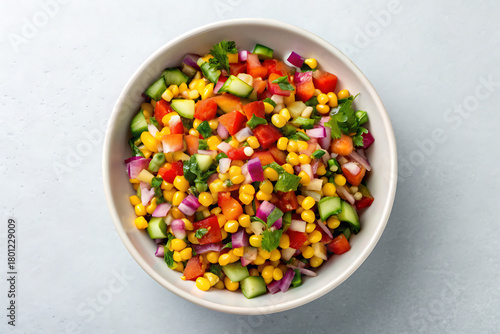 Fresh and colorful corn salad with tomatoes and cucumbers