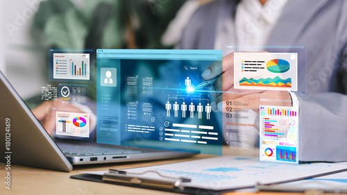 Marketer using digital marketing dashboard with charts, pie graphs, organization chart, and performance data. Concept of business analytics and strategic planning.