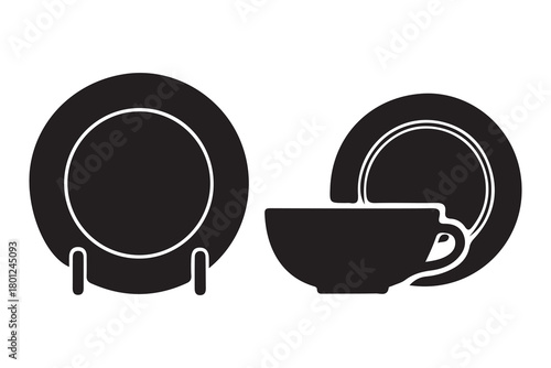 Black silhouette of a plate on a stand and a cup with a saucer isolated on white background