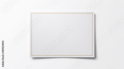 A crisp, elegant blank certificate with a simple gold border rests on a pristine white surface.