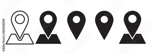 Set of five stylized map location pins or markers in black and white with varying designs and fill styles