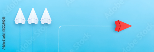 New normal concept with red paper plane in new direction