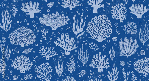 Seamless pattern of various marine organisms like coral, seaweed, and shells in an enchanting underwater blue background.