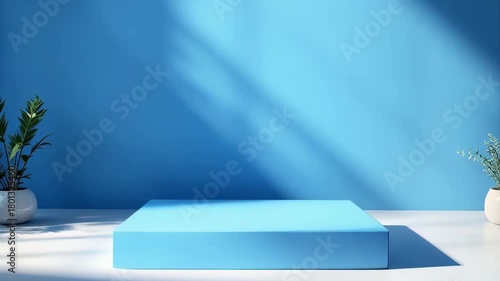 Bright Studio Interior With Blue Platform And Natural Sunlight Casting Shadows On Wall