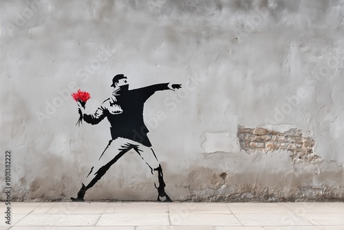 Graffiti Man Throwing Red Flowers Instead Of Weapon On Grunge Wall. Urban Protest Art Visual Symbolizing Peace, Revolution, And Anti-War Sentiment