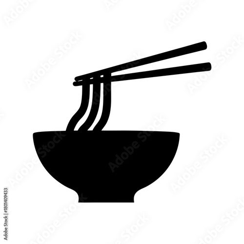 Noodles with chopsticks in a bowl, oriental cuisine