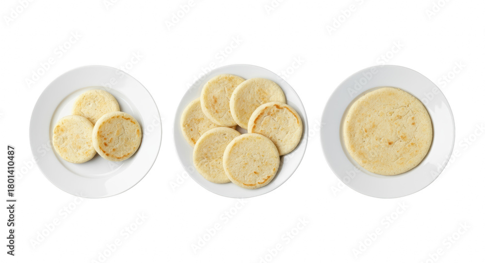 Fototapeta premium Cornmeal arepas arranged on white plates in assorted servings displayed in clean studio composition 