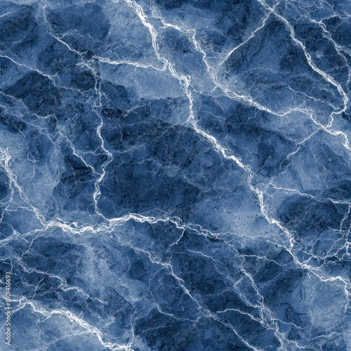 Textured blue marble surface with intricate white veining pattern creating a natural and elegant stone design for interiors and decor applications