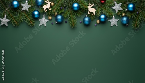 Luxury Christmas Garland with Blue Ornaments and Silver Stars on Dark Green Background