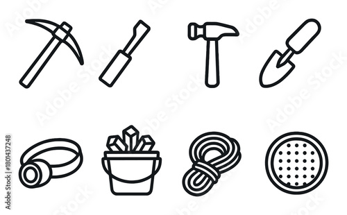 Set of mining and construction tools silhouettes on black background