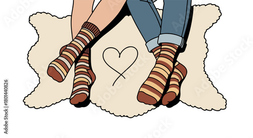 Couple's feet in socks on a pillow with a heart