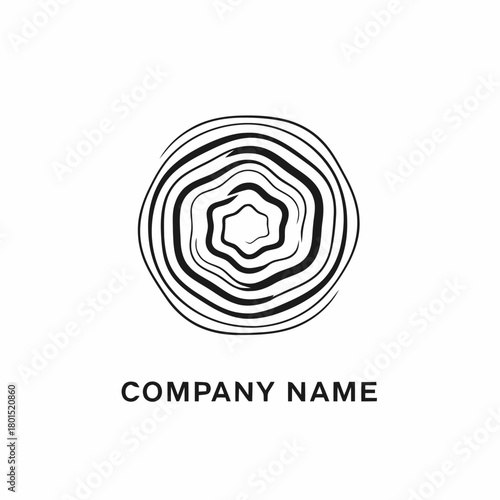 Abstract circular pattern with organic lines and central hexagon.