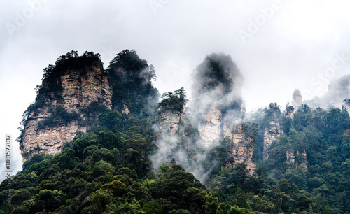 Hunan Province, China - October 27, 2025: Scenery of major tourist attractions in Hunan, including Tianmen Mountain in Zhangjiajie, the night view of Furong Ancient Town, and Yellow Dragon Cave.