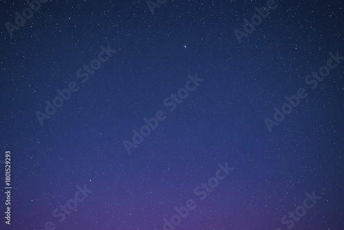 A striking illustration of a galactic black hole with vibrant colors