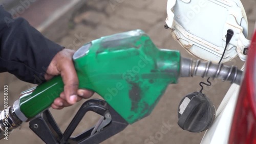 Gas pump nozzles at gas station