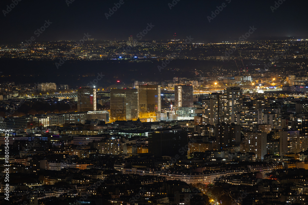 custom made wallpaper toronto digitalAerial view of glimmering lights dance across the Parisian skyline, illuminating modern skyscrapers against the velvet night, Paris, Ile-de-France, France.