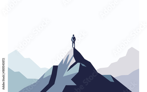 Silhouette of a businessman standing on a mountain peak