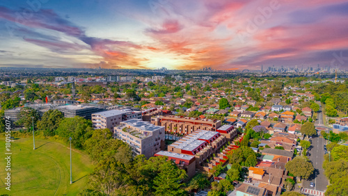 Aerial Panorama Drone View of a inner western Sydney Suburb of Ashbury Urban Sprawl and the terracotta roof tops streets and trees of Suburban Sydney  NSW Australia