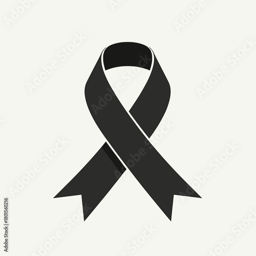 Black ribbon displayed as mourning motif in minimal style. Mourning motif evokes somber remembrance, grief, and respect.