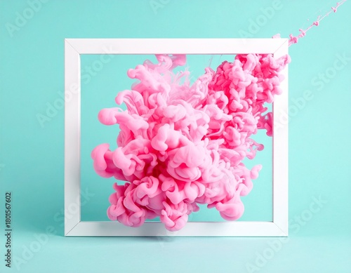 A vibrant, fluffy pink ink cloud explodes from the center of a minimalist white square frame against a serene teal blue background