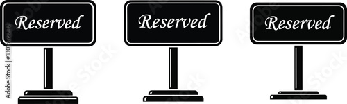 Three black reserved signs standing in a row on white background