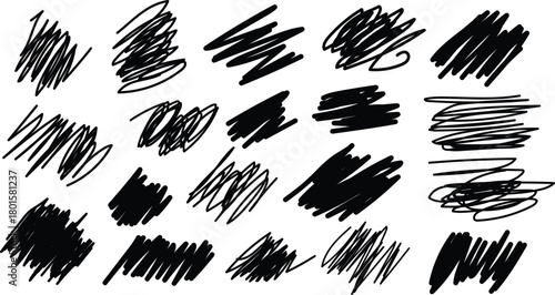 Collection of hand drawn black scribble brush strokes and smudges on white background