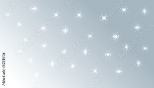 An abstract, subtle background featuring white, sparkling starbursts or lens flares scattered across a cool blue-grey gradient that fades to white in the bottom-left corner. Perfect for winter, celebr