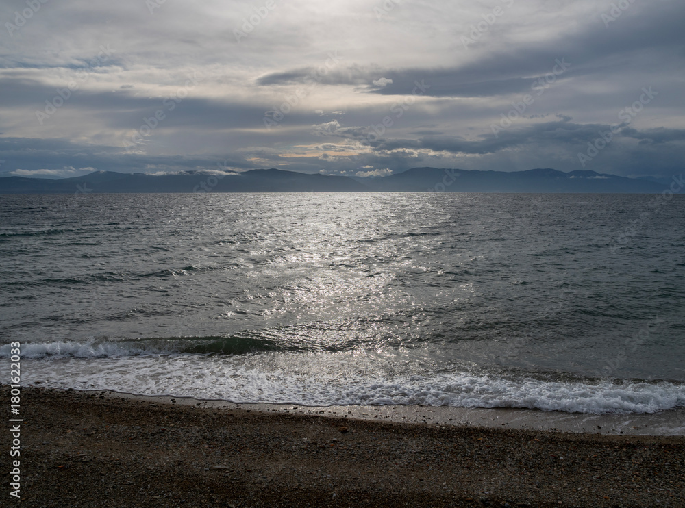 Fototapeta premium Clouds and stormy weather at Loutra Edipsou Spa resort on Evia Island in Greece