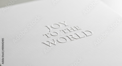 Elegant Embossed Christmas Card with Joy to the World Message.