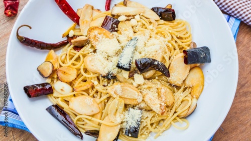 Delicious spaghetti with mushrooms and chili peppers